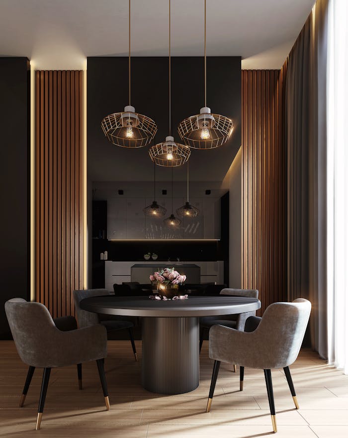 who-we-are A sophisticated, contemporary dining room with elegant lighting and luxurious furnishings.